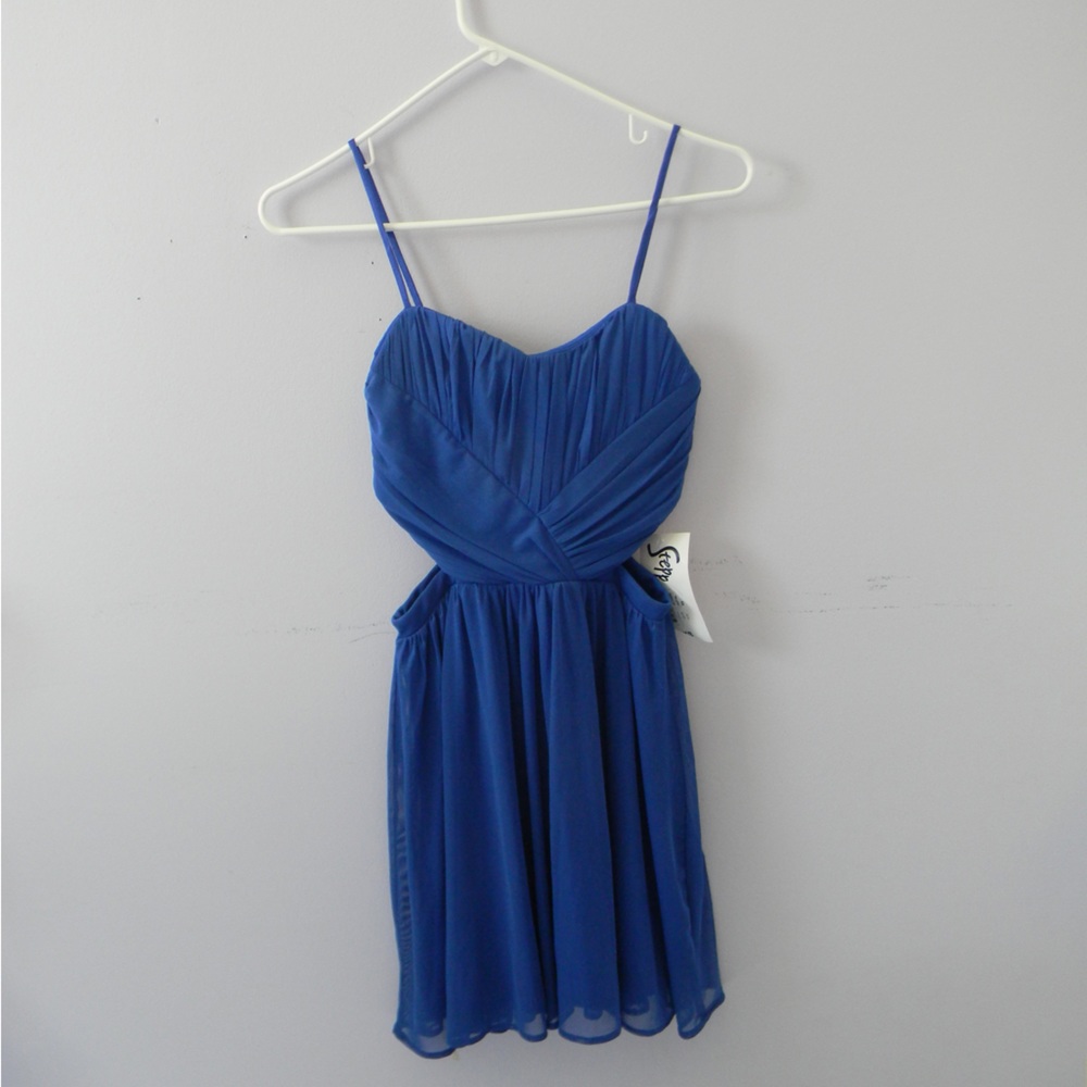 Steppin’ Out Royal Blue skater dress with waist cut outs